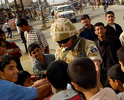 Soldiers from the East and West Riding Regiment, Territorial Army on foot patrol in Basra Iraq